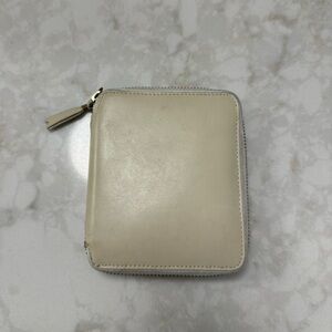 Comes Des Garçons classic zip around wallet
